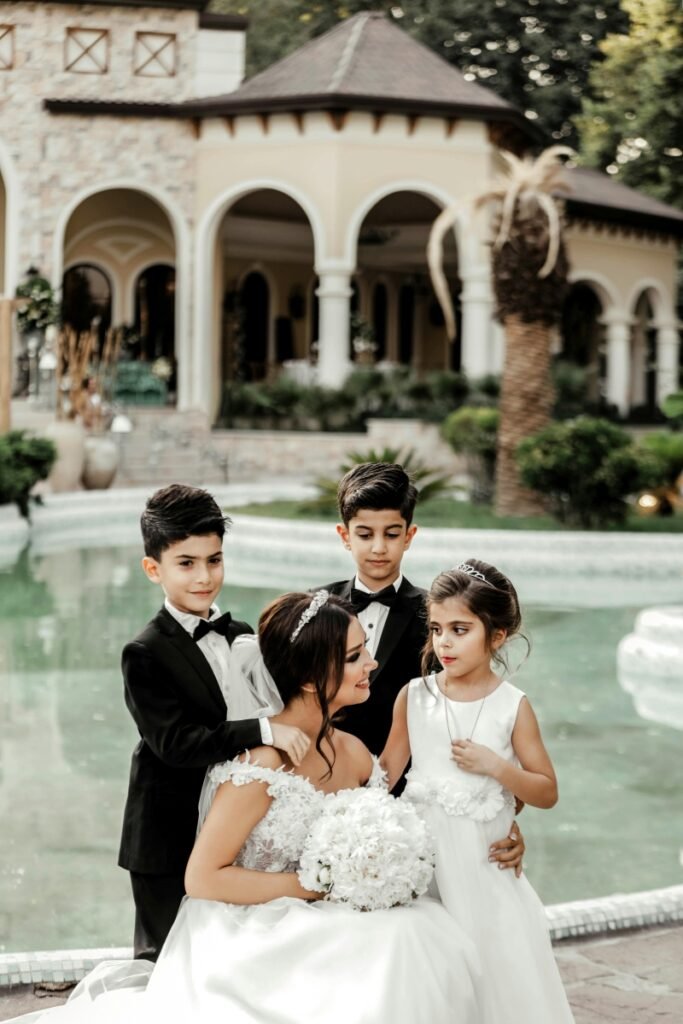 A bride surrounded by kids, illustrating the group buyout loophole that can bypass the rules of truly adults-only resorts.