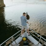 ouple enjoying quiet luxury travel spending on a private boat without crowds or children.