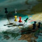 World map with pins showing best countries for childfree couples to live.