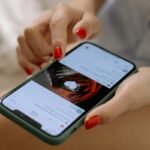 Woman browsing a dating app while building a childfree dating profile.